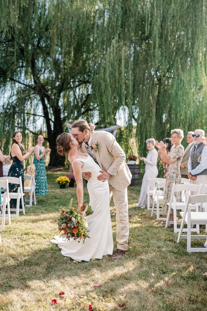 Outdoor wedding ceremony at The Homestead Farm Historic Wright-Barton Venue in Maryland