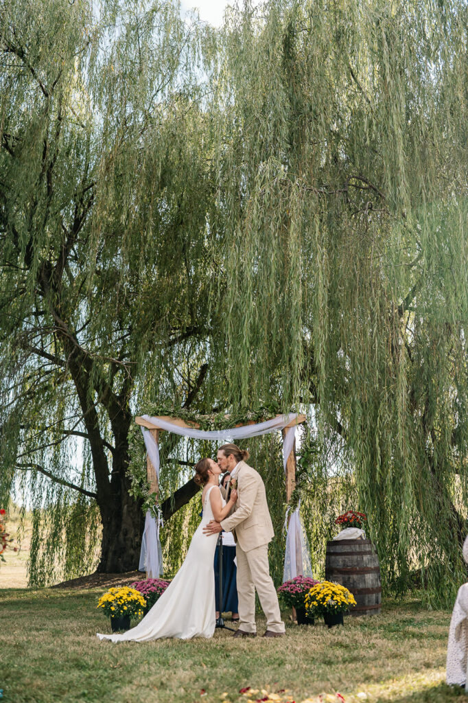 Outdoor wedding ceremony at The Homestead Farm Historic Wright-Barton Venue in Maryland
